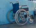 Empty wheelchair at accessible pool