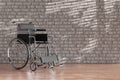 Empty Wheelchair in Front of Brick Wall. 3d Rendering Royalty Free Stock Photo