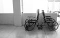 Empty wheelchair in hospital corridor Royalty Free Stock Photo