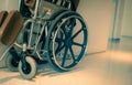 Empty wheelchair near hallway in hospital for service patient and people with disability. Medical equipment in hospital for Royalty Free Stock Photo