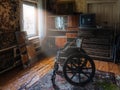 Empty wheelchair in old abandoned house Royalty Free Stock Photo