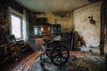 Empty wheelchair in old abandoned house Royalty Free Stock Photo