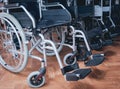 Empty wheelchairs at the hospital. Light Background.