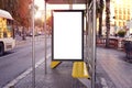 Empty white advertising urban billboard near city bus stop, placeholder template on a street, space for design layout. Royalty Free Stock Photo