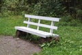 Empty white bench in the park Royalty Free Stock Photo