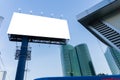 Empty white billboard on building. Modern ad and commercial concept. Mock up. A large blank billboard on a street wall signboard Royalty Free Stock Photo