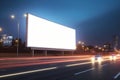 white billboard for your advertising stands in near the road at night Royalty Free Stock Photo