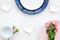 Empty white and blue colorful plate for table setting on stone table backgroung top view copy space Royalty Free Stock Photo