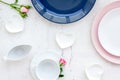 Empty white and blue colorful plate for table setting on stone table backgroung top view copy space Royalty Free Stock Photo