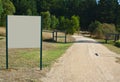 Empty white board in park Royalty Free Stock Photo