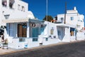 Empty white bus station near the road at Santorini island