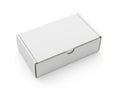 Empty white cardboard box with sliding lid placed on a plain surface Royalty Free Stock Photo