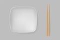 Empty white ceramic sushi plate with lying bamboo chopsticks Royalty Free Stock Photo