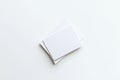 An empty white clean square business card and postcard mockup template to be displayed on a desktop table top backdrop Royalty Free Stock Photo