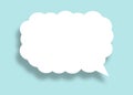 Empty white cloud paper speech bubble shape against light blue background Royalty Free Stock Photo