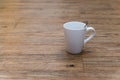 Empty white coffee mug on wooden table Royalty Free Stock Photo