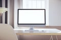Empty white computer screen in modern designer office Royalty Free Stock Photo