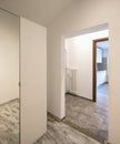 Empty white corridor with closet and tile Royalty Free Stock Photo