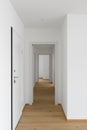 Empty white corridor with open doors Royalty Free Stock Photo