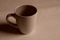 Empty white cup on a light background. Cup with place for text. Copyspace Royalty Free Stock Photo