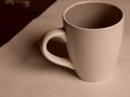 Empty white cup on a light background. Cup with place for text. Copyspace Royalty Free Stock Photo