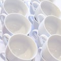 Empty White Cups Stacked on the Table. Tea or Coffee Catering Services at the Hotel, Event, Conference, Business meeting or Royalty Free Stock Photo