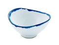 Empty white curve ceramic bowl with blue rim isolated on white background with clipping path, Side view