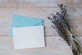 Empty white envelope paper card note template mock up. Copy space for your text. Lavender flower. Greeting or invitation Royalty Free Stock Photo