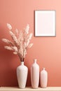 Empty white frame wall poster mock-up and beige three vases. Light pink wall. Dry plants in vase. Generated AI