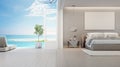 Sea view bedroom of luxury summer beach house with double bed near wooden floor terrace and swimming pool. Royalty Free Stock Photo