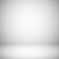Empty white and gray light studio room interior. 3d plain grey soft gradient vector background Royalty Free Stock Photo