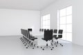 Empty white meeting room and conference table. 3d rendering