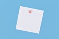 Empty white memo note paper pinned on blue wall Royalty Free Stock Photo