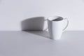 Empty white mug with shadow