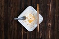 Empty white noodle bowl with spoon and chopsticks after eat on w Royalty Free Stock Photo