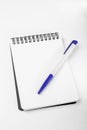 Empty white note, pen and blue clip Royalty Free Stock Photo