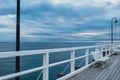 Empty white Old wood bridge pier against beautiful sunset sky natural background, backdrop wallpaper multipurpose sea Royalty Free Stock Photo