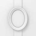 Empty white oval picture frame on the wall column