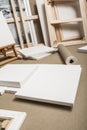 Empty white painter canvases and canvas roll and easel - painter program