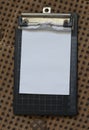 Empty white paper menu note on clip board