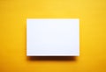 Empty white paper sheet isolated yellow background Royalty Free Stock Photo