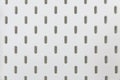 Empty white pegboard or holes wall for hanging tool texture background Royalty Free Stock Photo