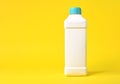 Empty white plastic bottle on a yellow background Royalty Free Stock Photo