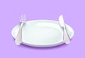 Empty white plate with fork and knife isolated on purple background. Clipping path included Royalty Free Stock Photo