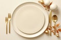 an empty white plate with gold cutlery and an egg on top Royalty Free Stock Photo