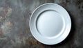 Empty White Plate On Gray Rustic Surface Royalty Free Stock Photo