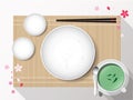 Empty white plate set with chopsticks on a bamboo cover. Vector Royalty Free Stock Photo