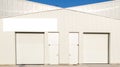 Empty white poster on warehouse store commercial industrial facade mockup entrance building Royalty Free Stock Photo