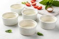 Empty white ramekins with strawberries and mint Royalty Free Stock Photo