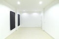 Empty white room with door and window Royalty Free Stock Photo